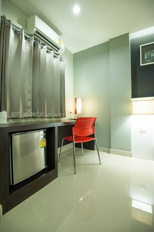 Imagen de la habitación del Hotel The Cozy Nest Boutique Rooms. Foto 27