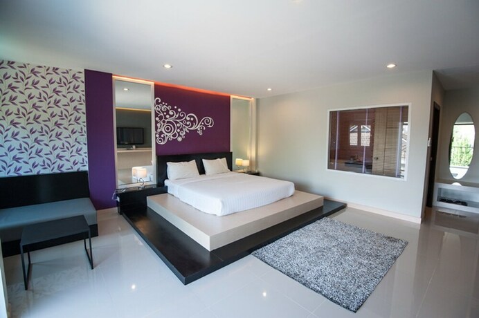 Imagen de la habitación del Hotel The Cozy Nest Boutique Rooms. Foto 31