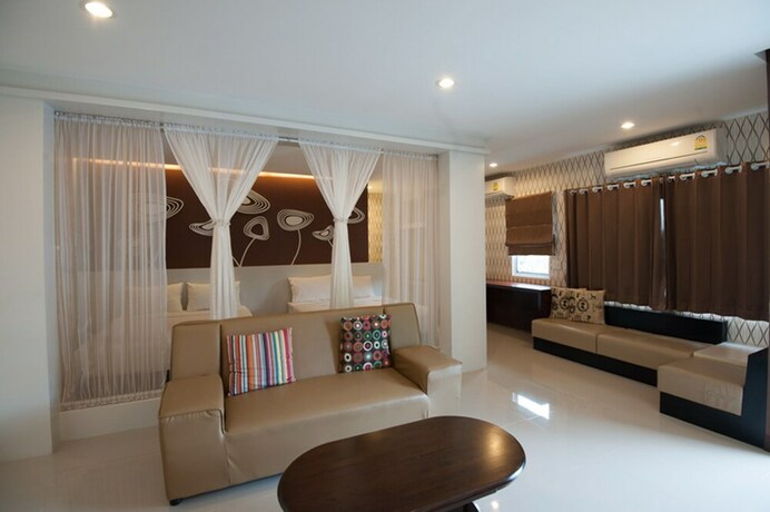 Imagen de la habitación del Hotel The Cozy Nest Boutique Rooms. Foto 34