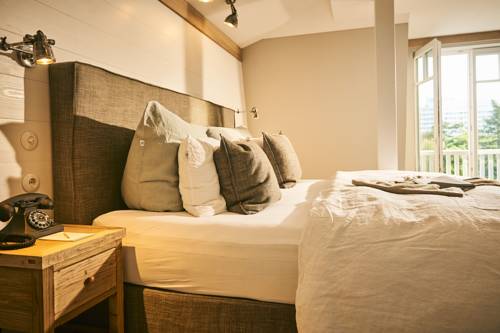 Imagen de la habitación del Hotel The Cozy Timmendorfer Strand. Foto 6