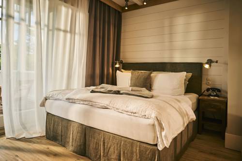 Imagen de la habitación del Hotel The Cozy Timmendorfer Strand. Foto 9