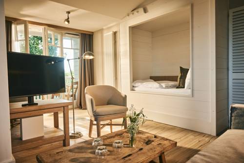 Imagen de la habitación del Hotel The Cozy Timmendorfer Strand. Foto 12