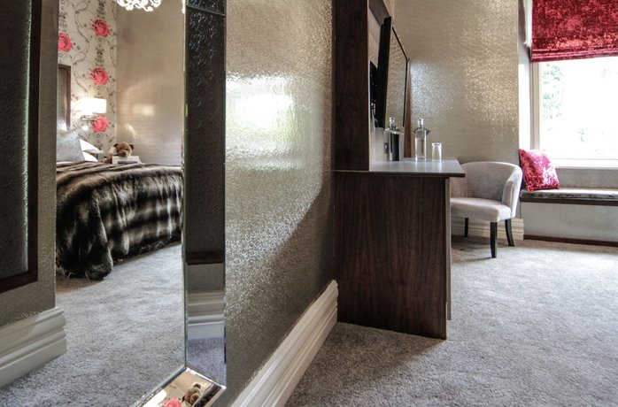 Imagen de la habitación del Hotel The Cranleigh Boutique. Foto 4