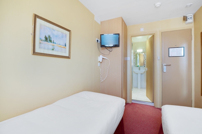 Imagen de la habitación del Hotel The Craven. Foto 9