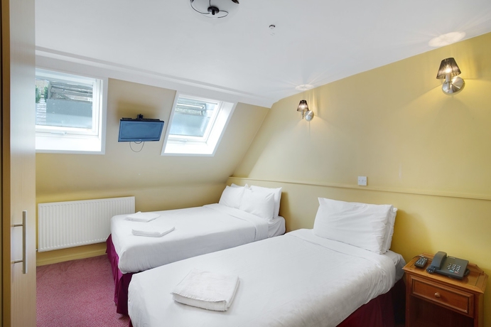 Imagen de la habitación del Hotel The Craven. Foto 14