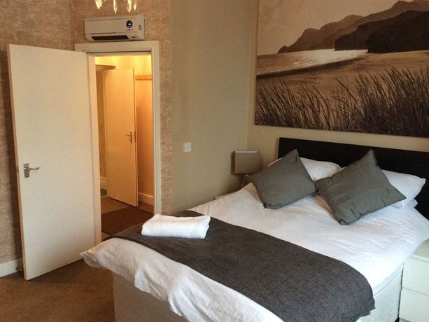 Imagen de la habitación del Hotel The Crescent Apartments. Foto 6