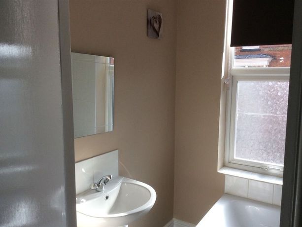 Imagen de la habitación del Hotel The Crescent Apartments. Foto 7