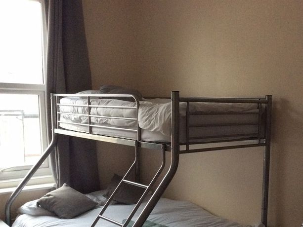 Imagen de la habitación del Hotel The Crescent Apartments. Foto 14