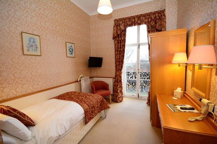 Imagen de la habitación del Hotel The Crescent. Foto 9