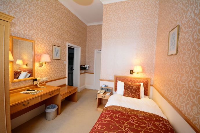 Imagen de la habitación del Hotel The Crescent. Foto 15