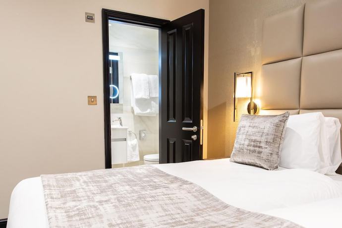 Imagen de la habitación del Hotel The Crescent Hyde Park. Foto 4