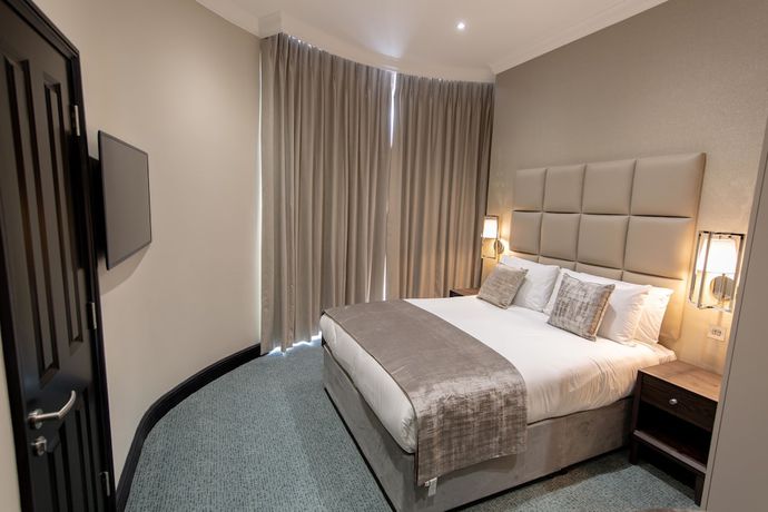 Imagen de la habitación del Hotel The Crescent Hyde Park. Foto 8