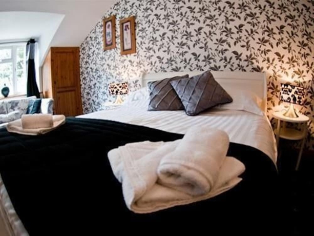 Imagen de la habitación del Hotel The Crooked Inn - Inn. Foto 11
