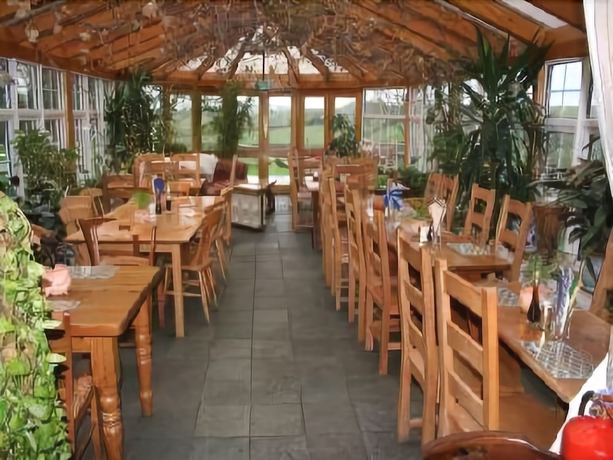 Imagen del bar/restaurante del Hotel The Crooked Inn - Inn. Foto 3