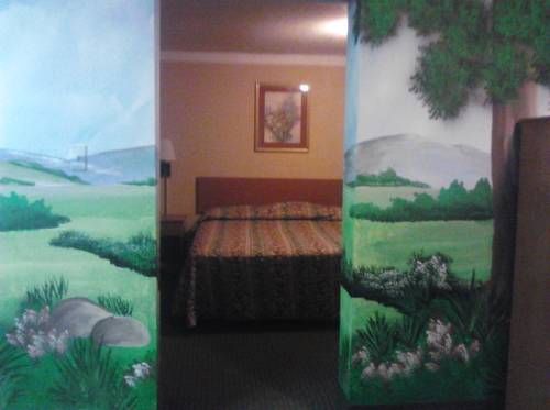 Imagen de la habitación del Hotel The Crossroads and Suites. Foto 9