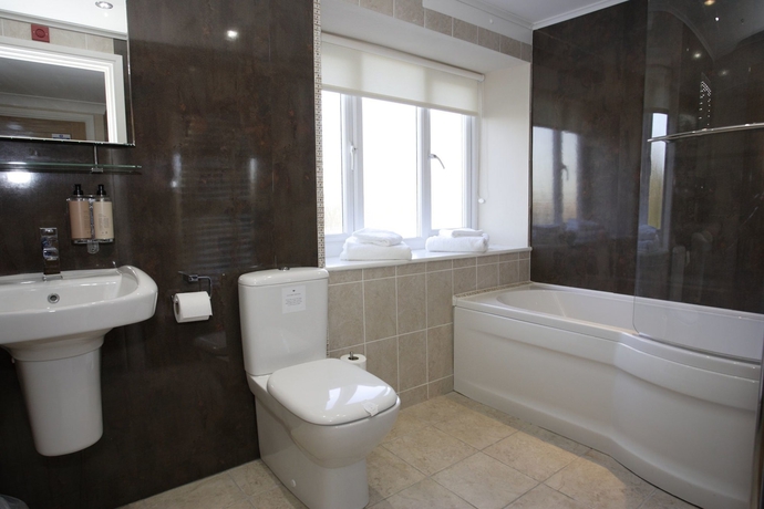 Imagen de la habitación del Hotel The Crossways. Foto 11