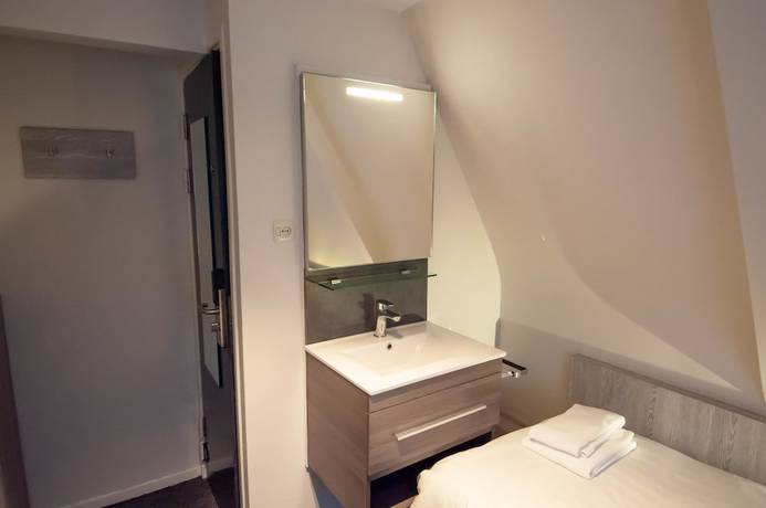 Imagen de la habitación del Hotel The Crown, &Aacute;msterdam. Foto 12