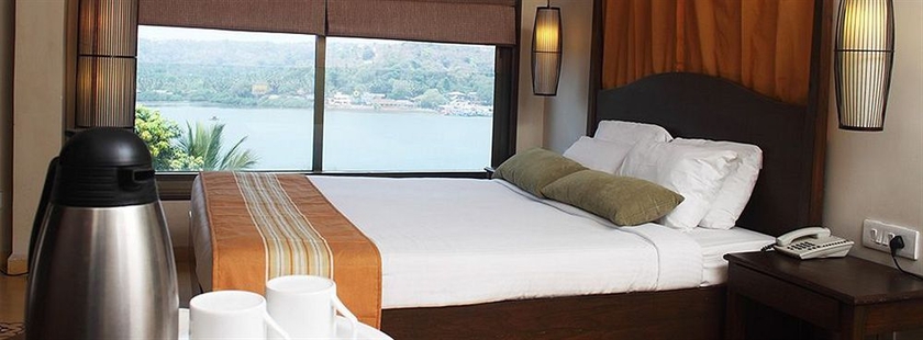 Imagen de la habitación del Hotel The Crown Goa. Foto 5