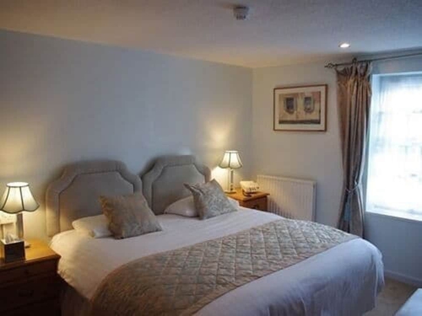 Imagen de la habitación del Hotel The Crown House. Foto 2