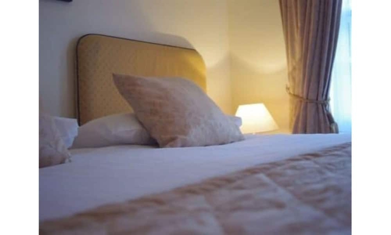 Imagen de la habitación del Hotel The Crown House. Foto 3