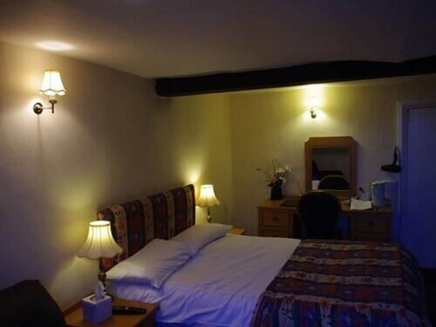 Imagen de la habitación del Hotel The Crown House. Foto 4