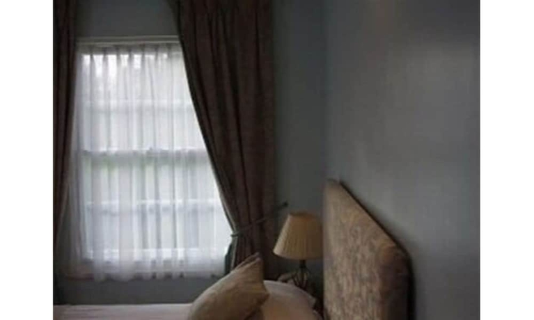 Imagen de la habitación del Hotel The Crown House. Foto 5