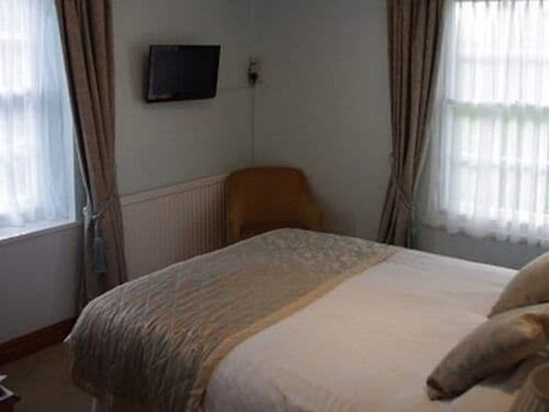 Imagen de la habitación del Hotel The Crown House. Foto 8