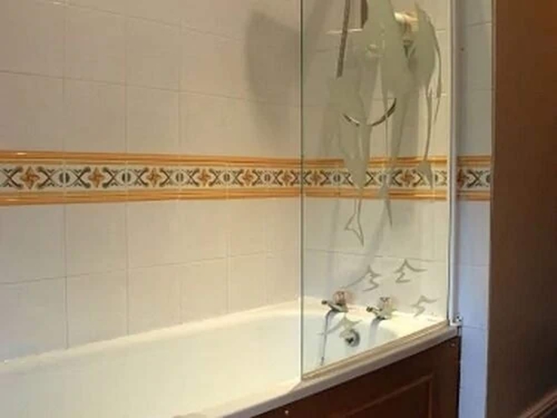 Imagen de la habitación del Hotel The Crown House. Foto 9