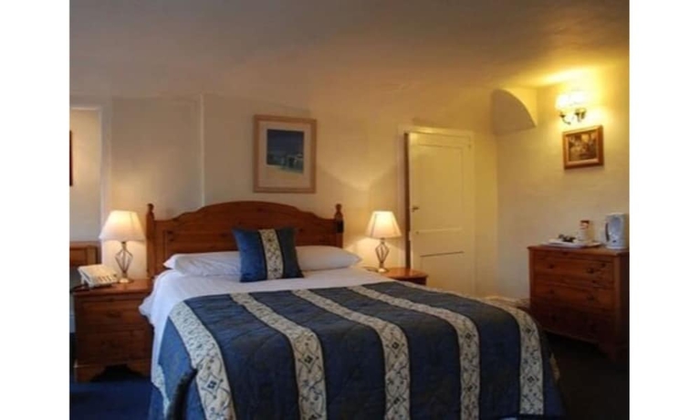 Imagen de la habitación del Hotel The Crown House. Foto 12