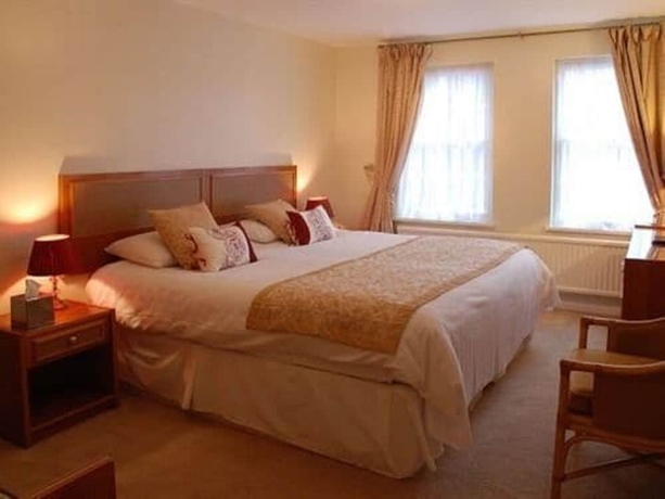 Imagen de la habitación del Hotel The Crown House. Foto 13