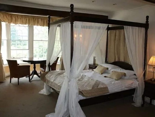 Imagen de la habitación del Hotel The Crown House. Foto 14