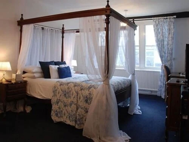 Imagen de la habitación del Hotel The Crown House. Foto 16