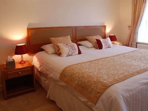 Imagen de la habitación del Hotel The Crown House. Foto 17