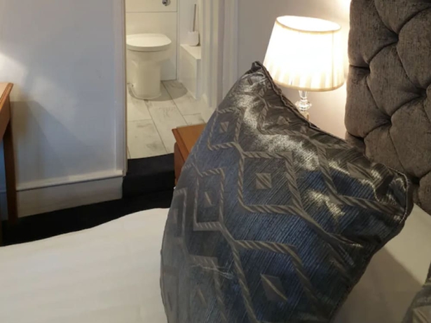 Imagen de la habitación del Hotel The Crown House. Foto 18