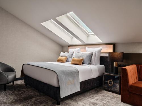 Imagen de la habitación del Hotel The Crown Krakow - Handwritten Collection. Foto 16