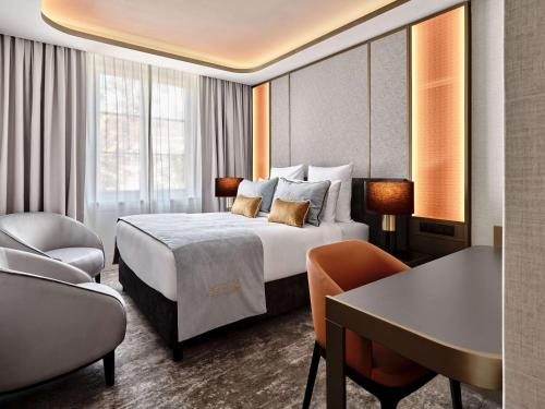 Imagen de la habitación del Hotel The Crown Krakow - Handwritten Collection. Foto 17