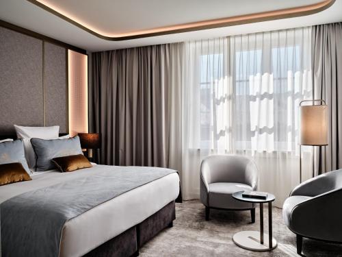 Imagen de la habitación del Hotel The Crown Krakow - Handwritten Collection. Foto 19