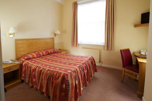 Imagen de la habitación del Hotel The Crown, Weymouth. Foto 8
