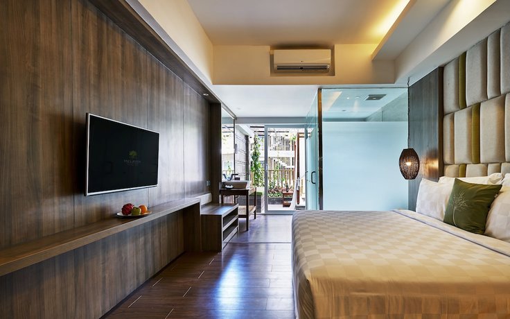 Imagen de la habitación del Hotel The Crystal Luxury Bay Resort Nusa Dua. Foto 8