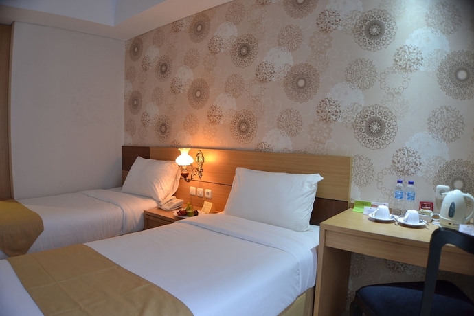 Imagen de la habitación del Hotel The Cube Malioboro. Foto 8