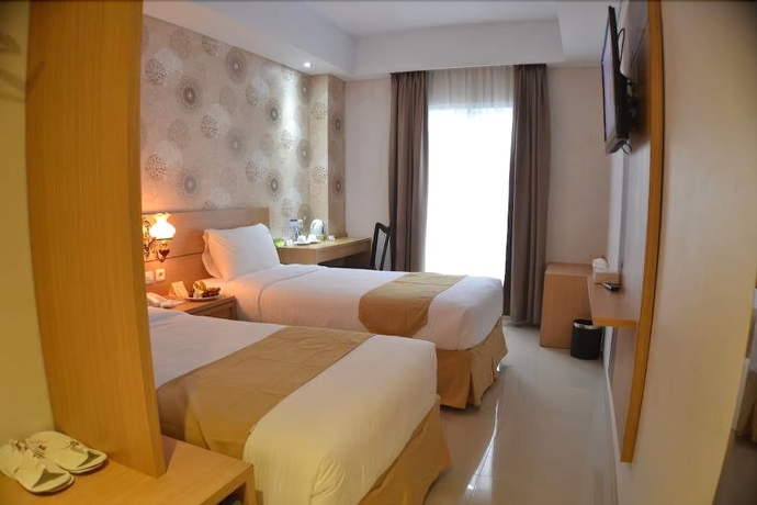 Imagen de la habitación del Hotel The Cube Malioboro. Foto 9