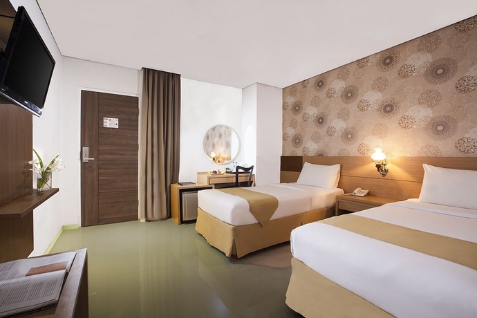 Imagen de la habitación del Hotel The Cube Malioboro. Foto 10