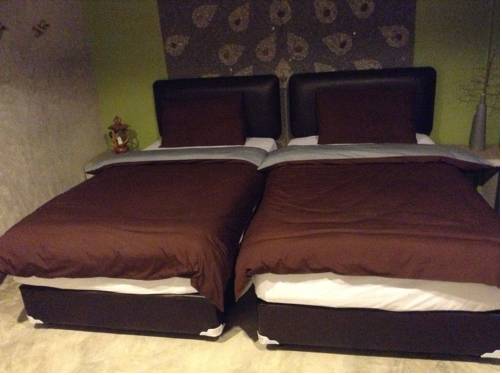 Imagen de la habitación del Hotel The Curve Residence Hua Hin. Foto 15