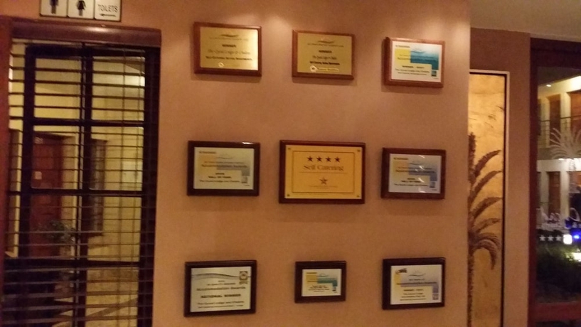 Imagen de los interiores del Hotel The Cycad Lodge And Chalets. Foto 19