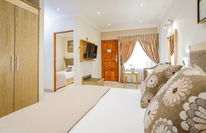 Imagen de la habitación del Hotel The Cycad Lodge And Chalets. Foto 4