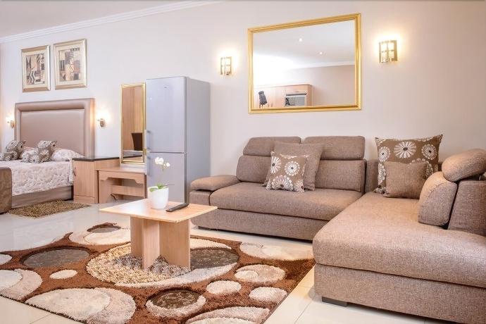 Imagen de la habitación del Hotel The Cycad Lodge And Chalets. Foto 10