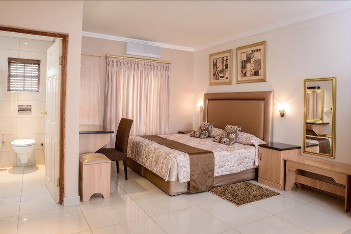 Imagen de la habitación del Hotel The Cycad Lodge And Chalets. Foto 13
