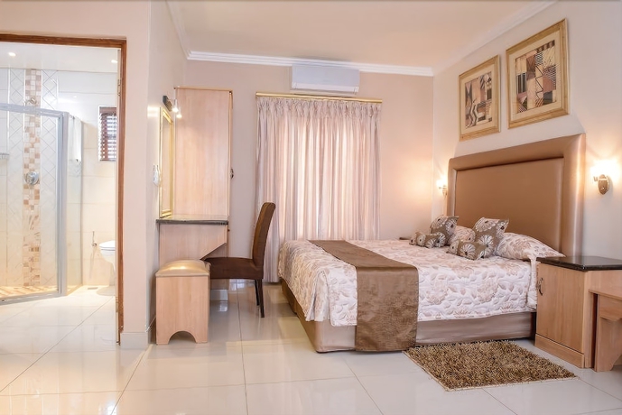 Imagen de la habitación del Hotel The Cycad Lodge And Chalets. Foto 14