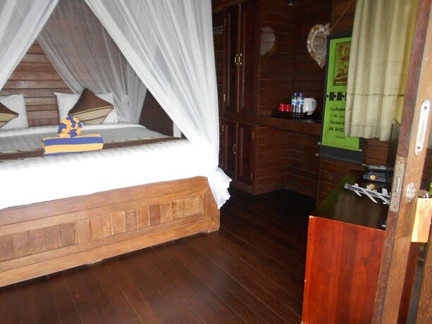 Imagen de la habitación del Hotel The Dafish Ceningan. Foto 23