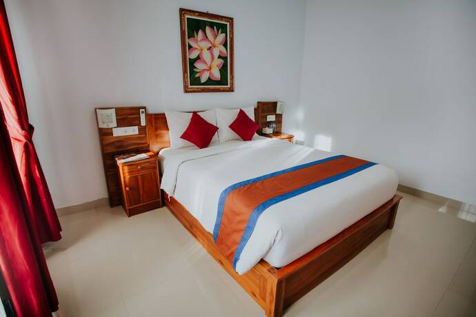 Imagen de la habitación del Hotel The Dagan Bungalow. Foto 17